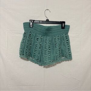 Rewind teal green lace shorts with a wide elastic waist and crochet detailing.